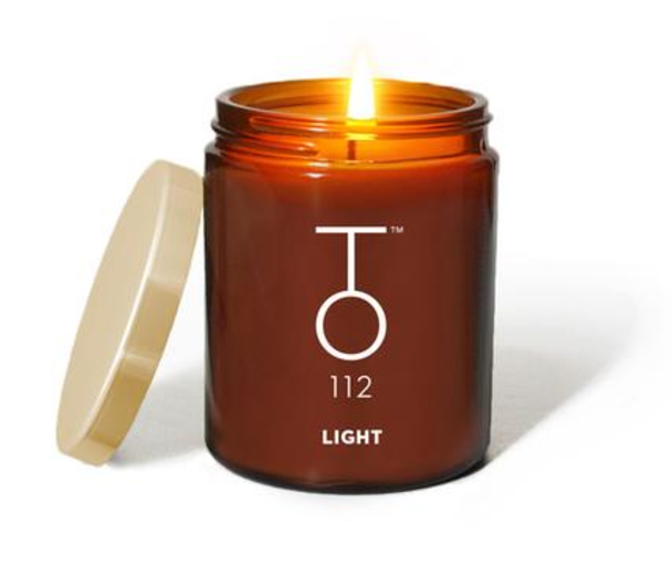 TO112 Palo Santo candle on white background