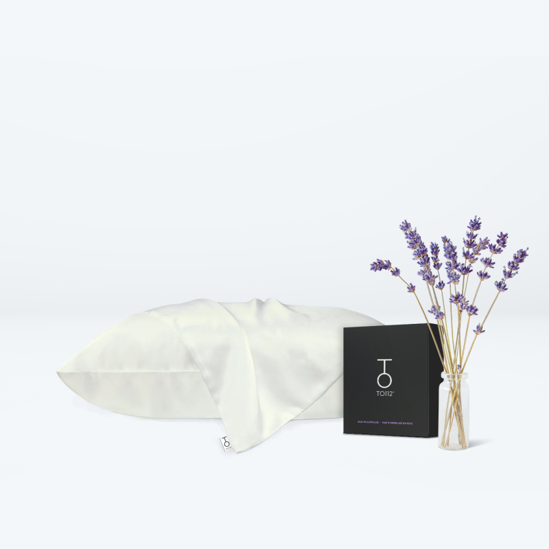 To112 Silk pillowcase beside pillowcase box and flower vase with dried lavender