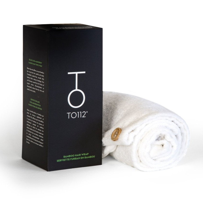 Stock image of To112 Bamboo Hair Towel beside box